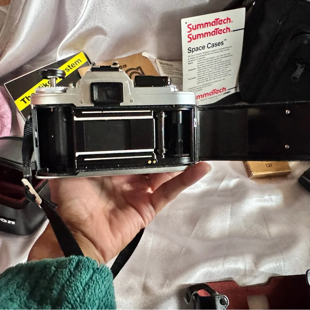 FG Nikon 35mm SLR camera with accessories